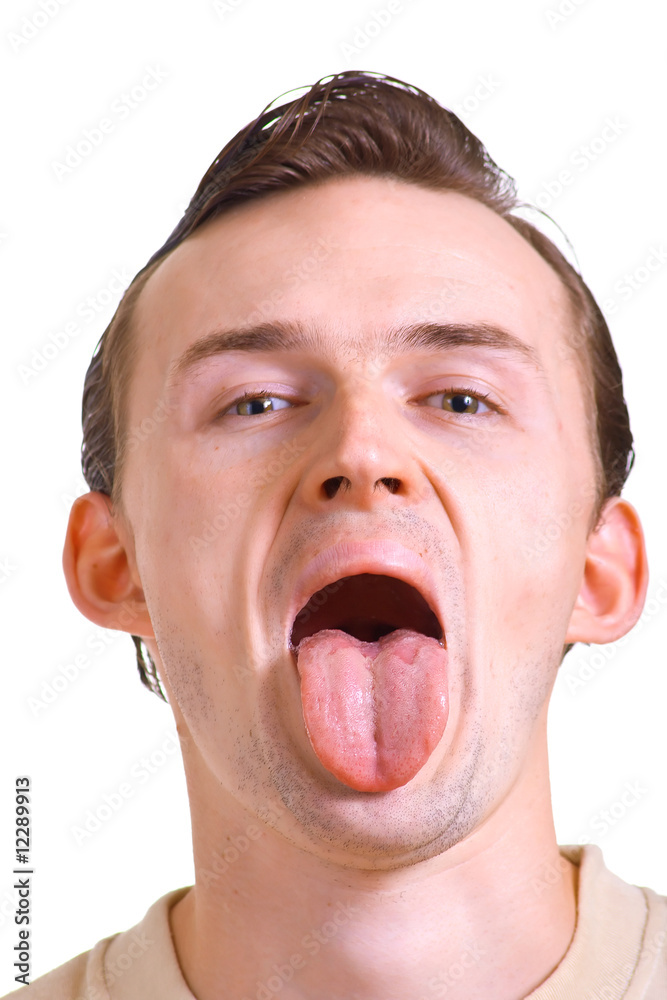 young man with put out a tongue young man with put out a tongue