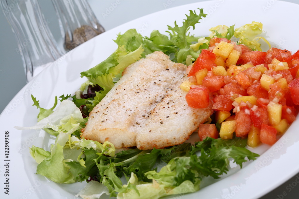 Fish dish - roasted cod with vegetable salad Fish dish - roasted cod with vegetable salad