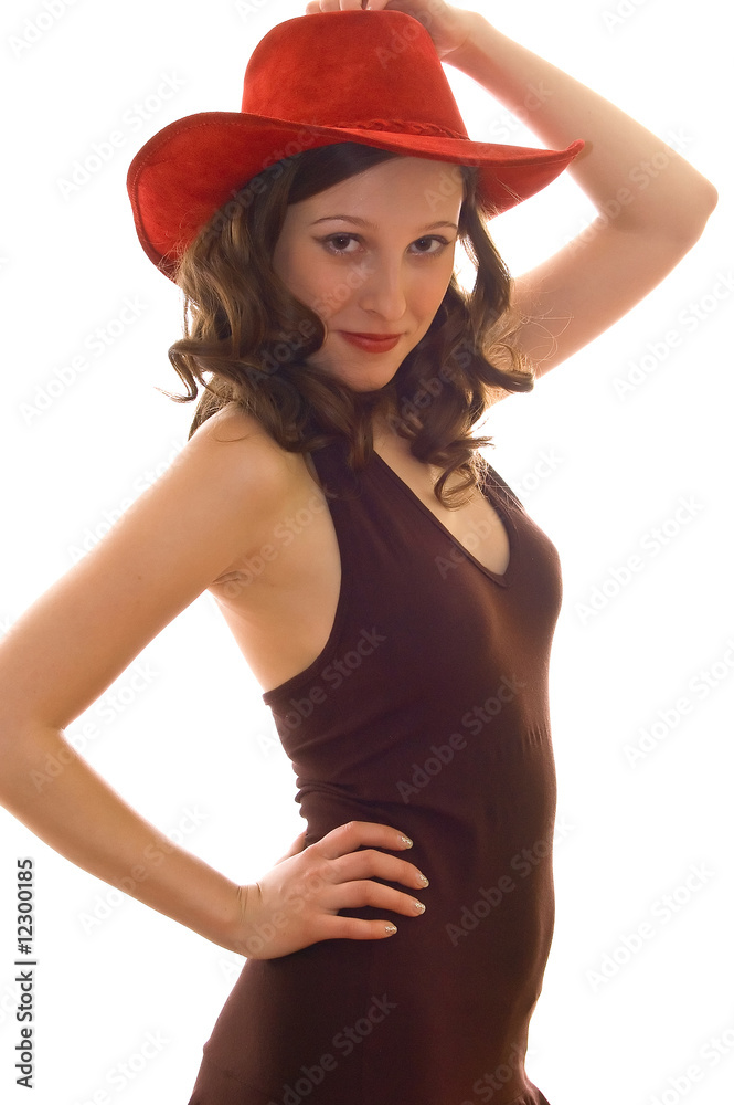 girl in a red hat and brown dress