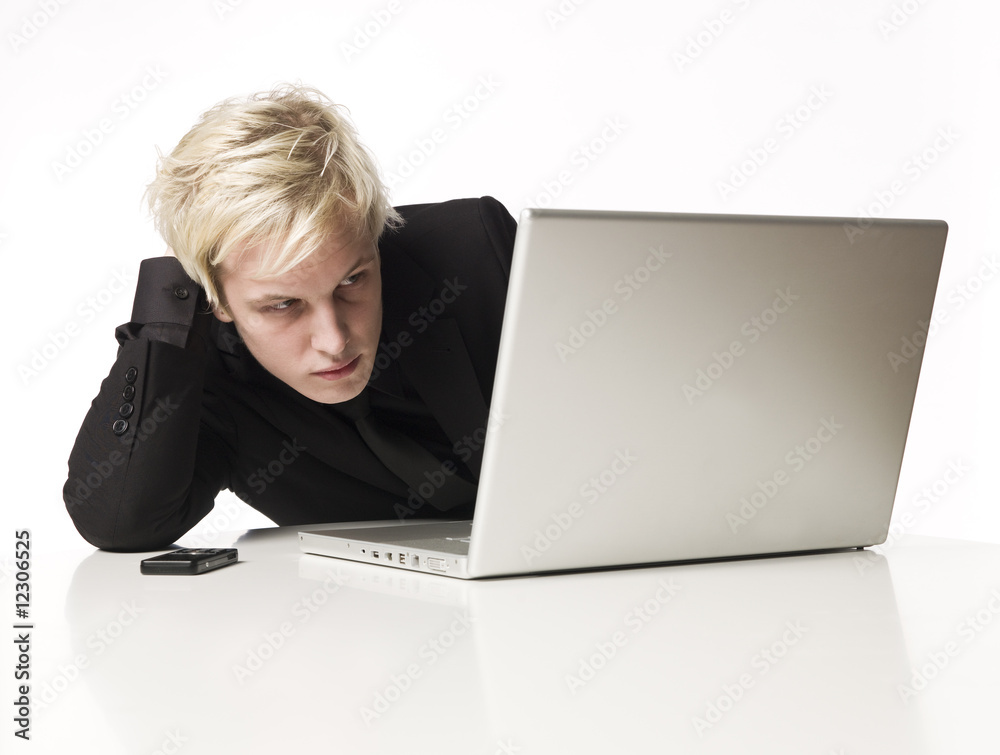 Man reading on a computer Man reading on a computer