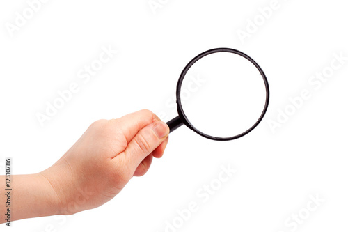 Woman hand holding magnifying glass isolated