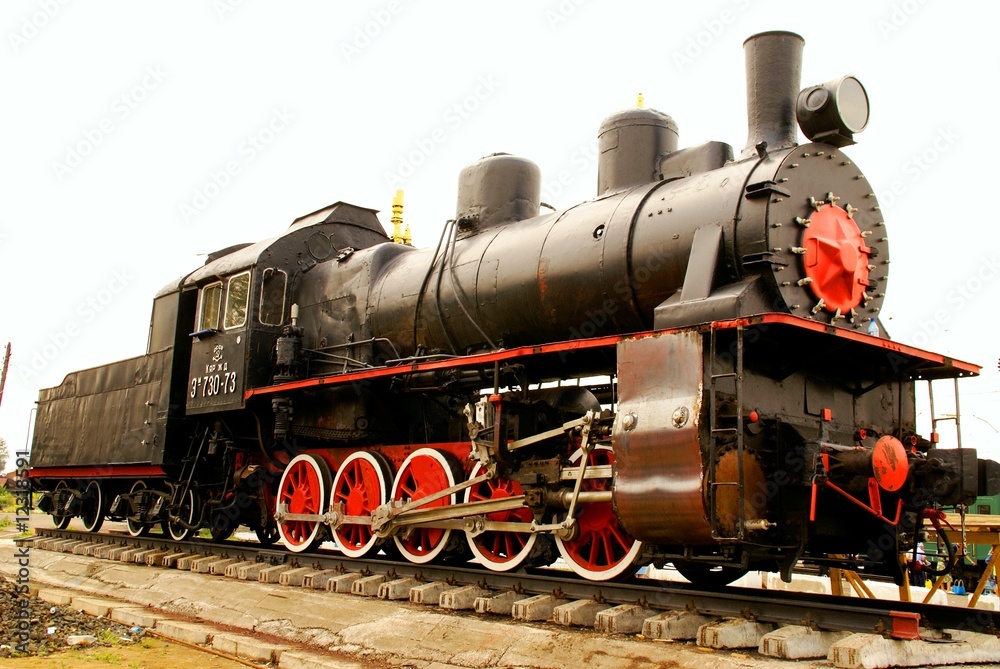 Naklejka premium Steam locomotive standing like monument