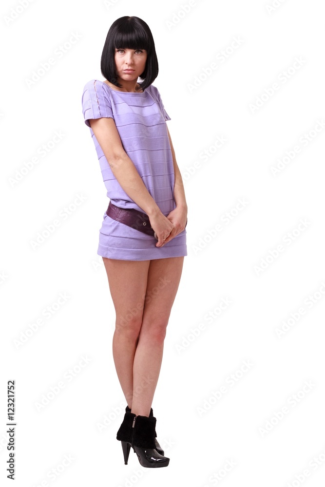 Fototapeta premium young woman standing against isolated white background