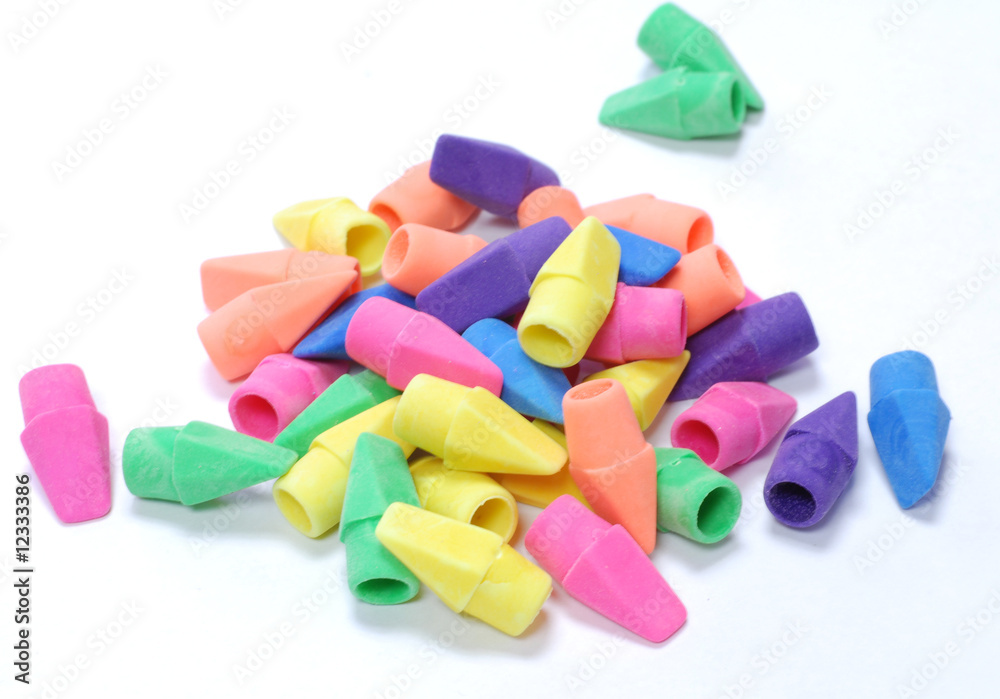stack of colorful eraser ends on white background stack of colorful eraser ends on white background