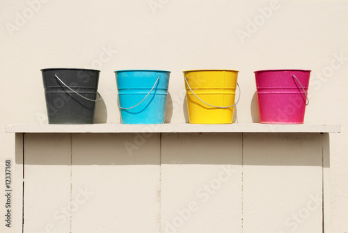 Four buckets of different colors