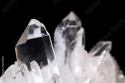 Quartz crystals on black photo