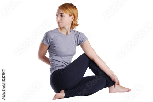 Female doing yogatic exericise. photo