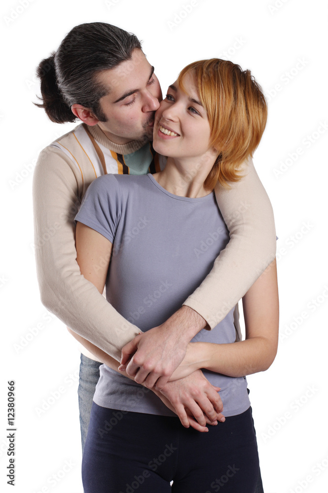 Couple in love smiling. Over white background Couple in love smiling. Over white background