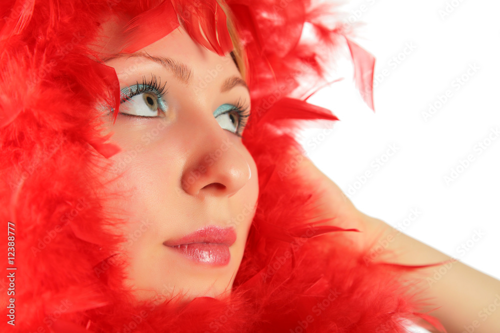 Portrait of girl in red feathers