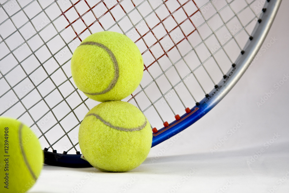 tennis  racket and balls on white background
