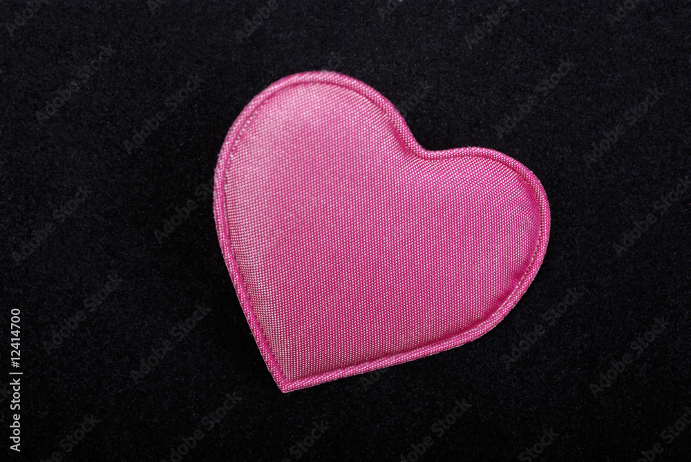 Obraz premium Pink fabric heart symbol love romance black background Valetine
