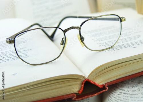 Books and Glasses on it