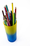 colourful crayons in cup on a white background