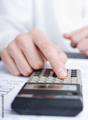 business man calculating