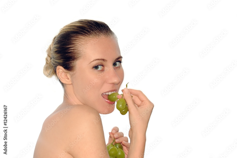 Portrait of women with beautiful face and green grapes Portrait of women with beautiful face and green grapes