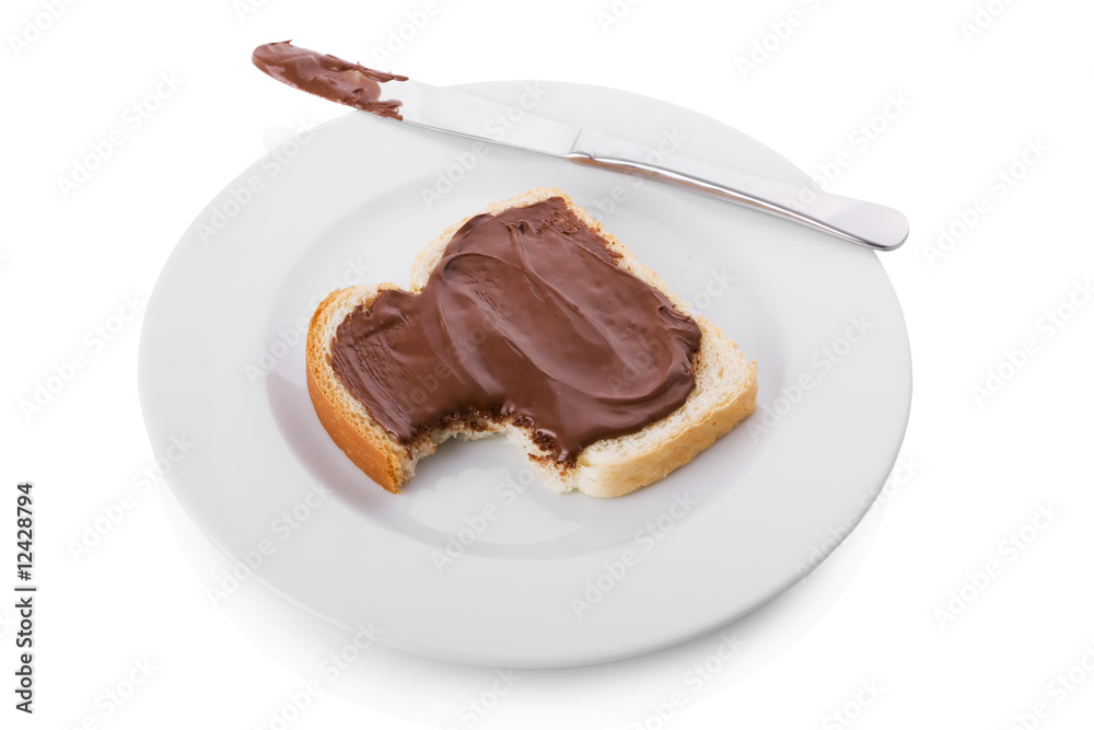 Bitten slice of bread covered with Hazelnut and chocolate spread Bitten slice of bread covered with Hazelnut and chocolate spread
