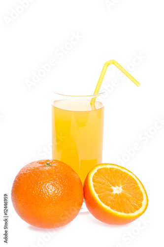 orange and juice in glass