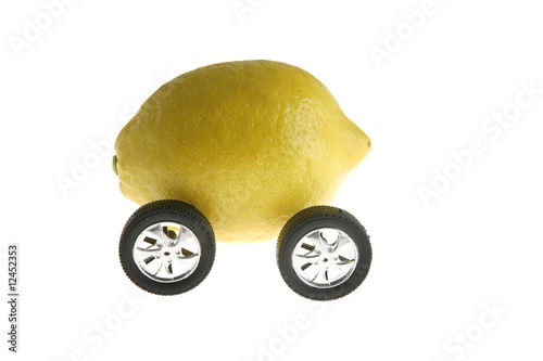 Картината върху платно Ecological transport metaphor, lemon and wheels