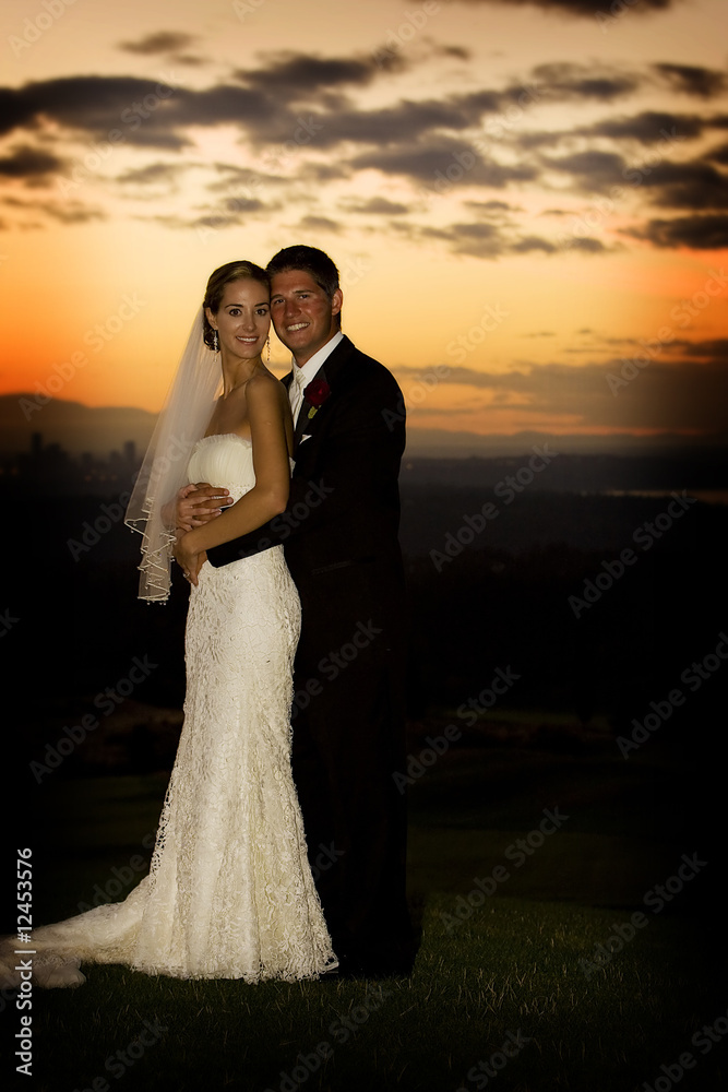 Wedding Couple at Romantic Sunset Wedding Couple at Romantic Sunset