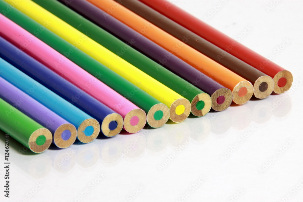 colored pencils reflecting on white background colored pencils reflecting on white background