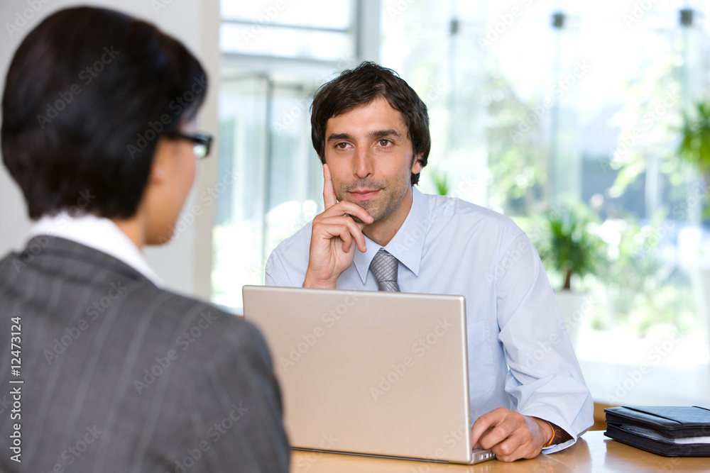 businessman talking to client businessman talking to client
