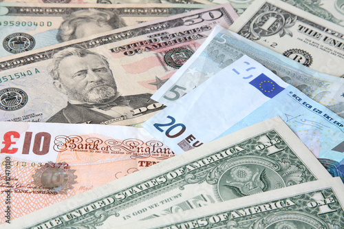 World currencies: U.S. dollars, pounds and euros.