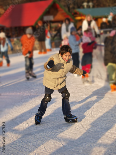 children while ice skating © Lucky Dragon USA