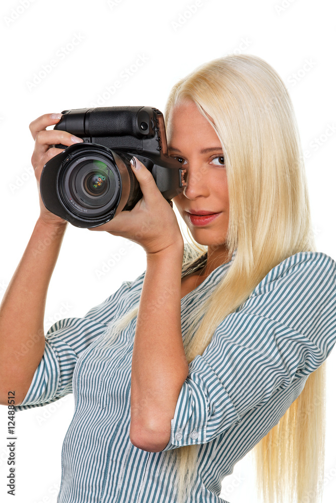 Junges Mädchen mit einer Digitalkamera Junges Mädchen mit einer Digitalkamera