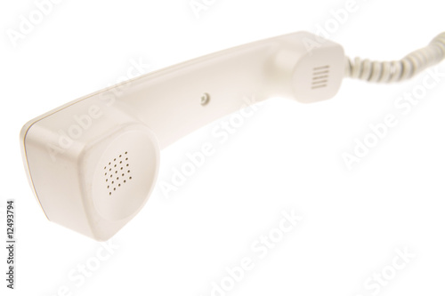 Telephone receiver on white background