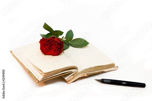 Diary and  red rose