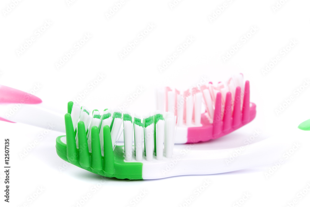 two toothbrushes two toothbrushes