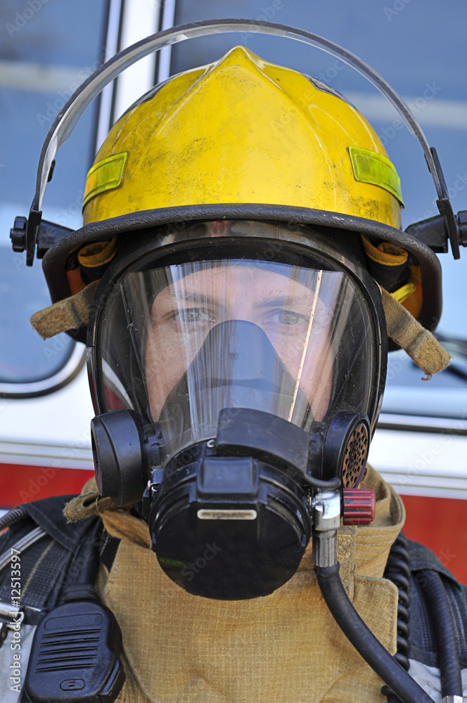 Fototapeta premium Fireman wearing air mask