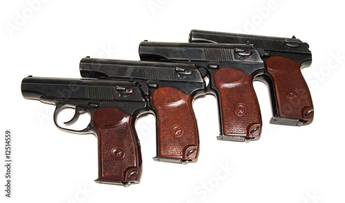 Four pistols on white background