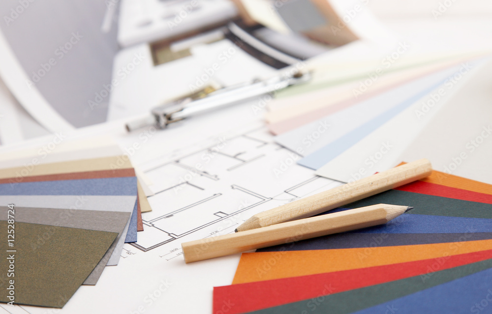 designer's desk with tools, color sample and blueprint designer's desk with tools, color sample and blueprint