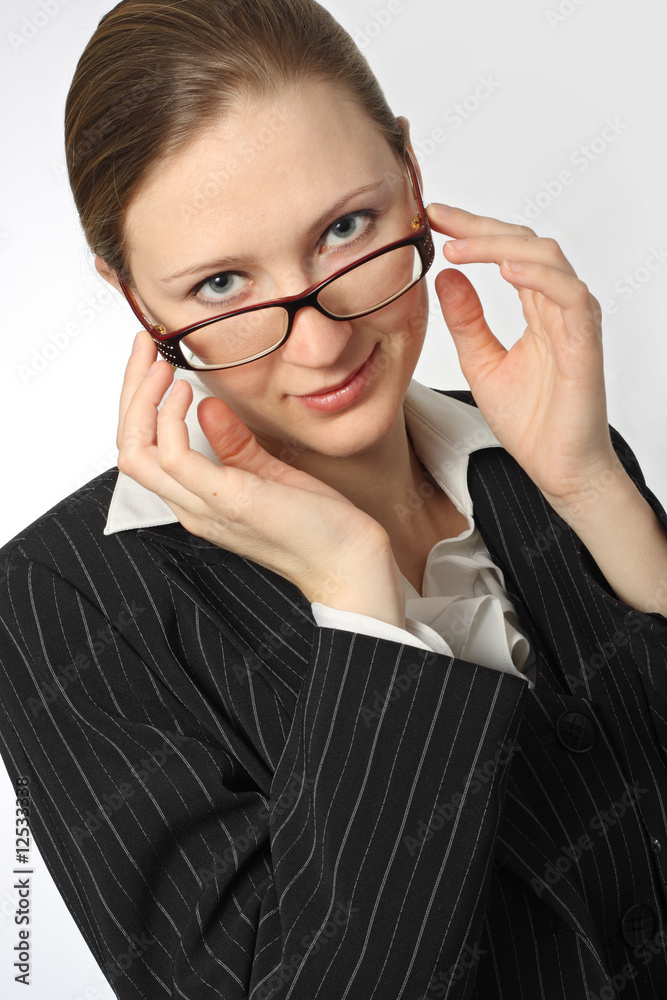 Young beautiful businesswoman with glasses