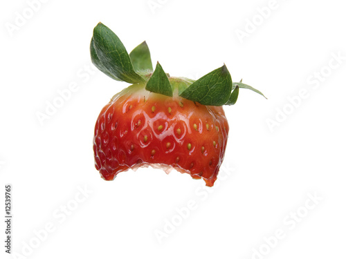 One Organic partially eaten Strawberry