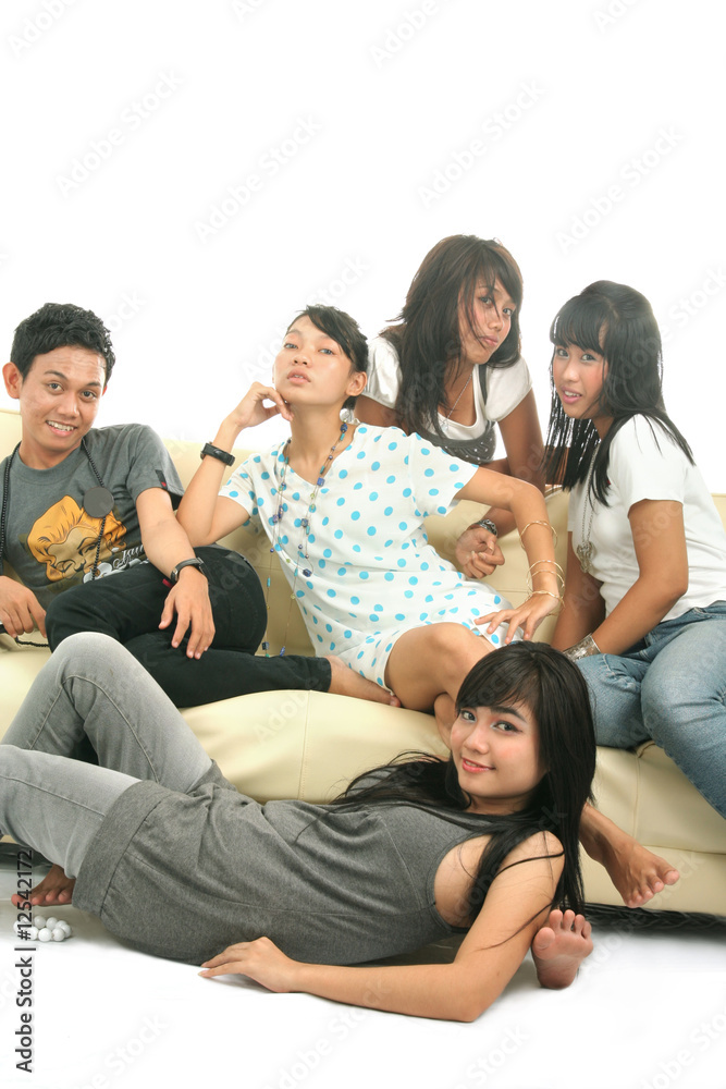 group of young people on sofa group of young people on sofa