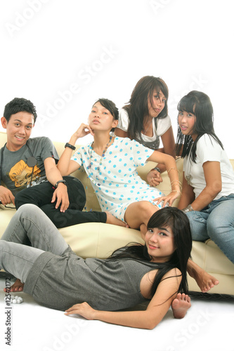 group of young people on sofa