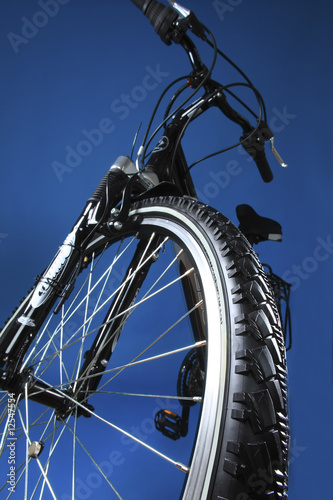 Mountain bicycle on a dark blue background
