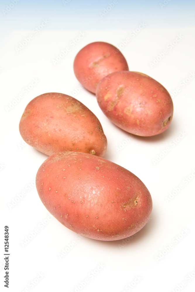 Red rooster potatoes isolated on a white studio background. Red rooster potatoes isolated on a white studio background.