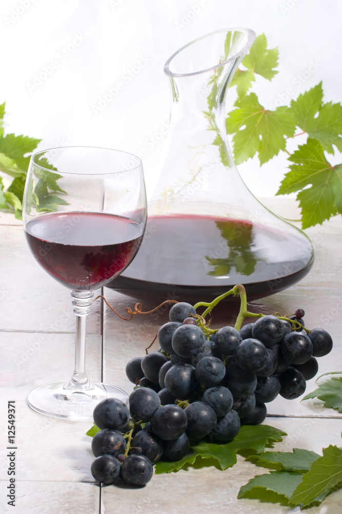 Red wine and grapes