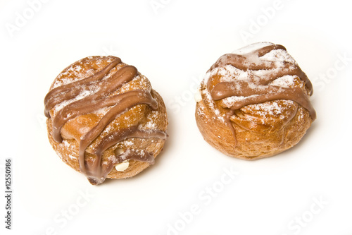 Cream buns isolated on a white studio background.