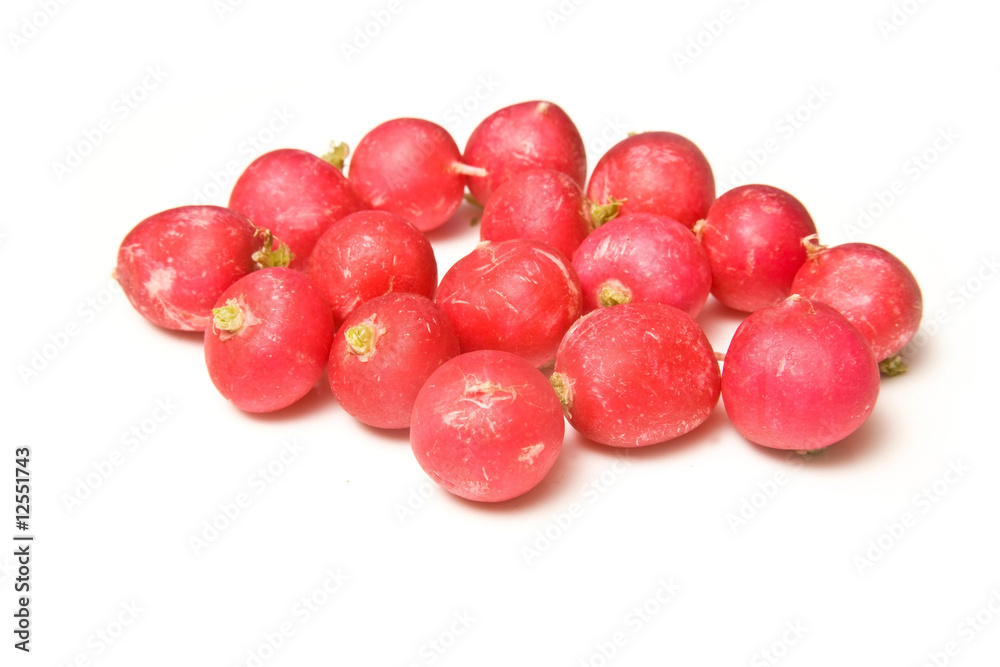 Radishes isolated on a white studio background. Radishes isolated on a white studio background.