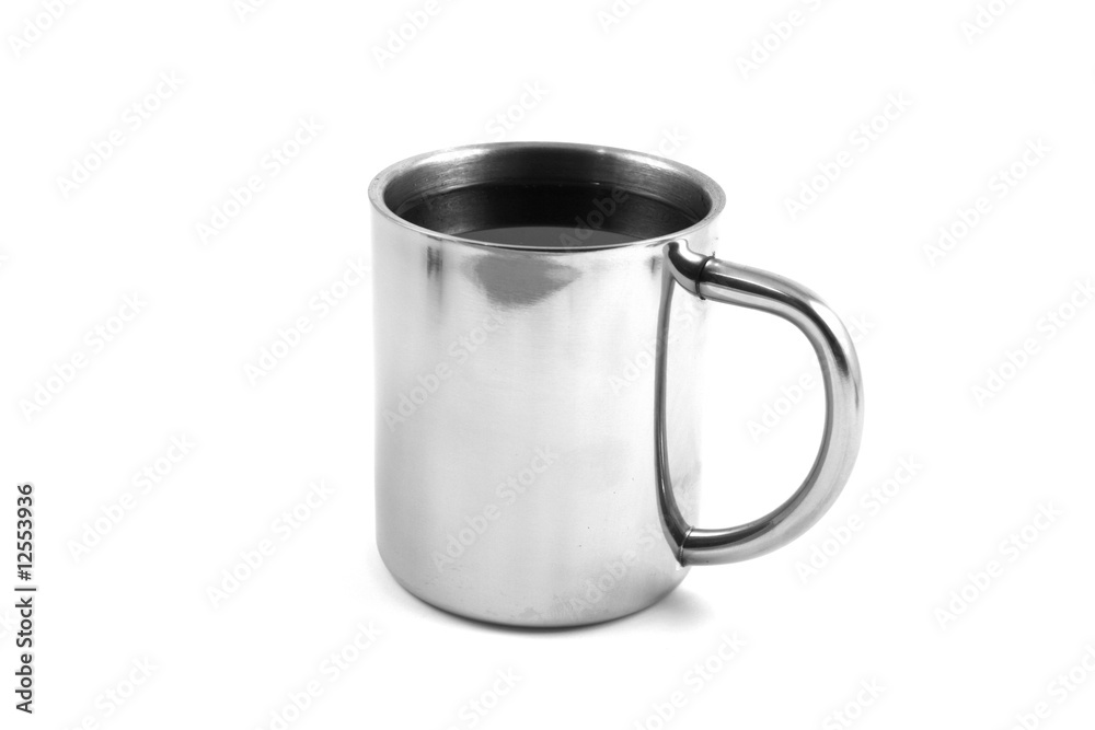 steel cup of coffee close up isolated in studio