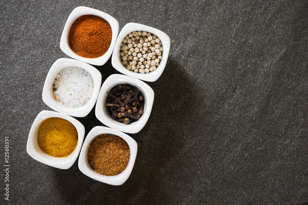 view over several pots with ground spices