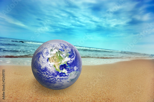 Earth globe on the beach © Photocreo Bednarek