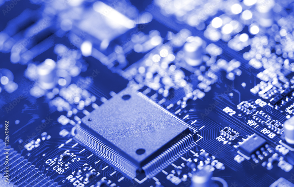 close-up microchip on circuit board close-up microchip on circuit board