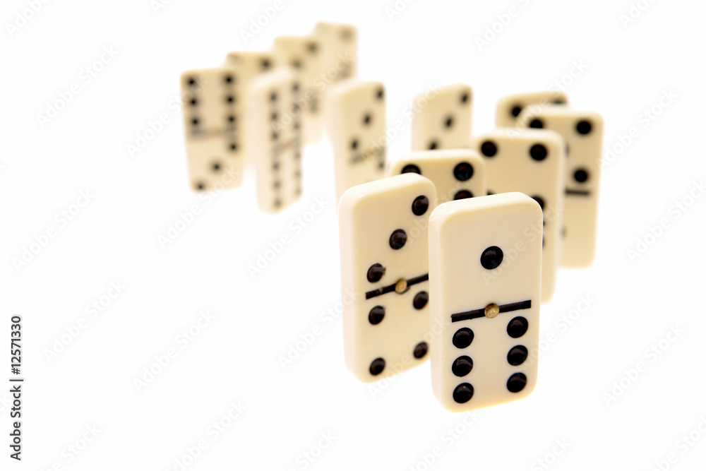 Dominoes standing on white background Dominoes standing on white background