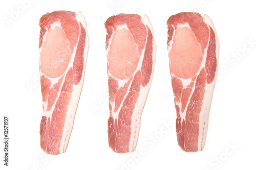Rashers of bacon isolated on a white studio background. photo