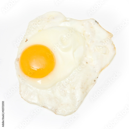 Fried egg isolated on a white studio background.